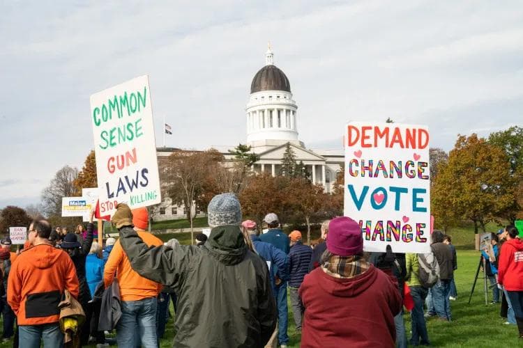 People rally in Augusta for stricter gun laws